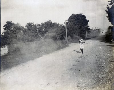 Sam Mellor of the Mohawk Athletic Club Running Alone, Along the Dirt Road, in the Marathon Race at the 1904 Olympics by Jessie Tarbox Beals